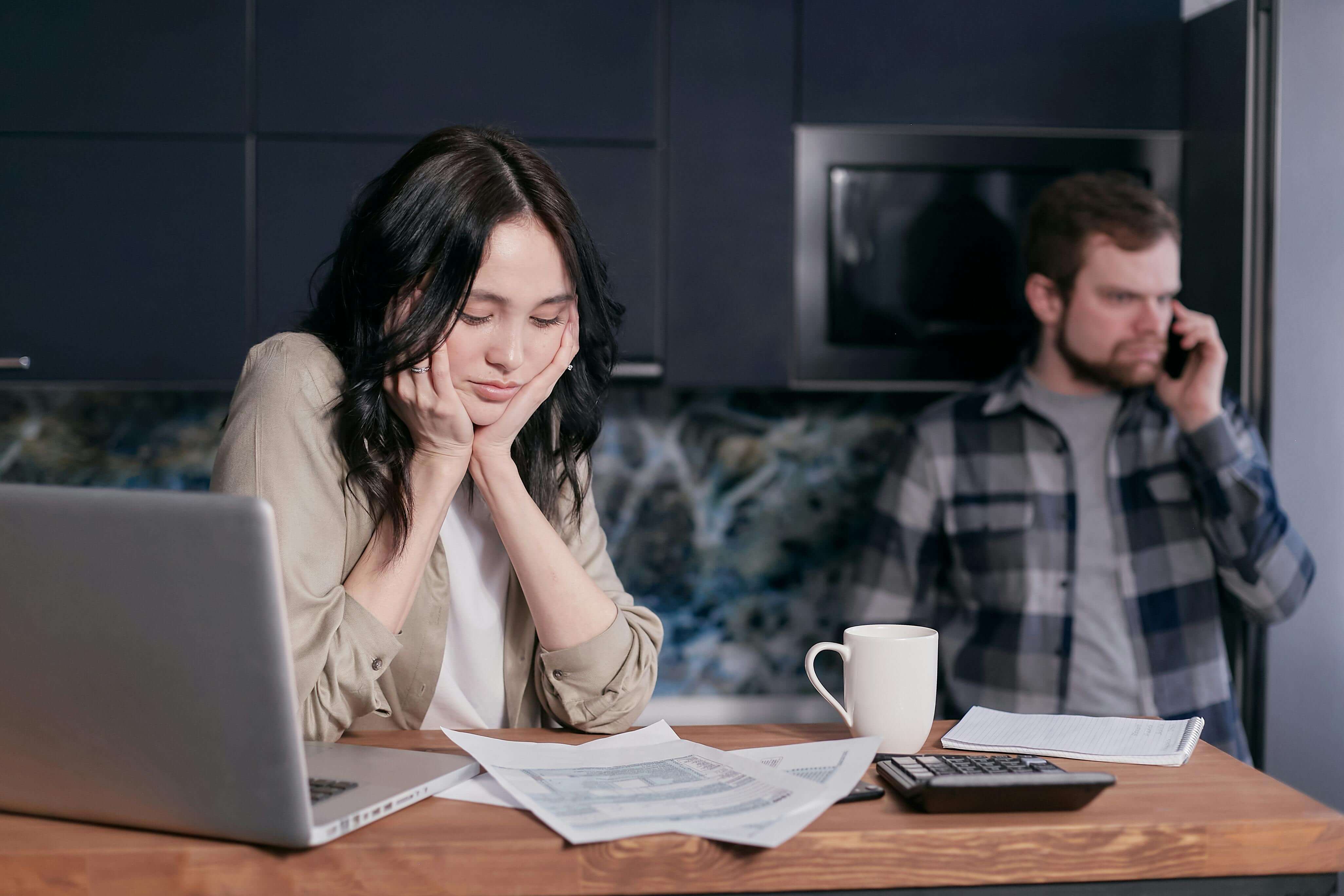 A frustrated couple working through financial issue.